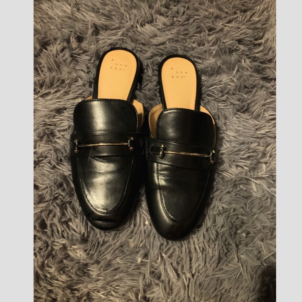 Black mules gold buckle